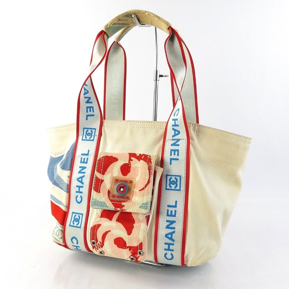 CHANEL Handbags - CHANEL Cream Tote with Red and Blue Accents